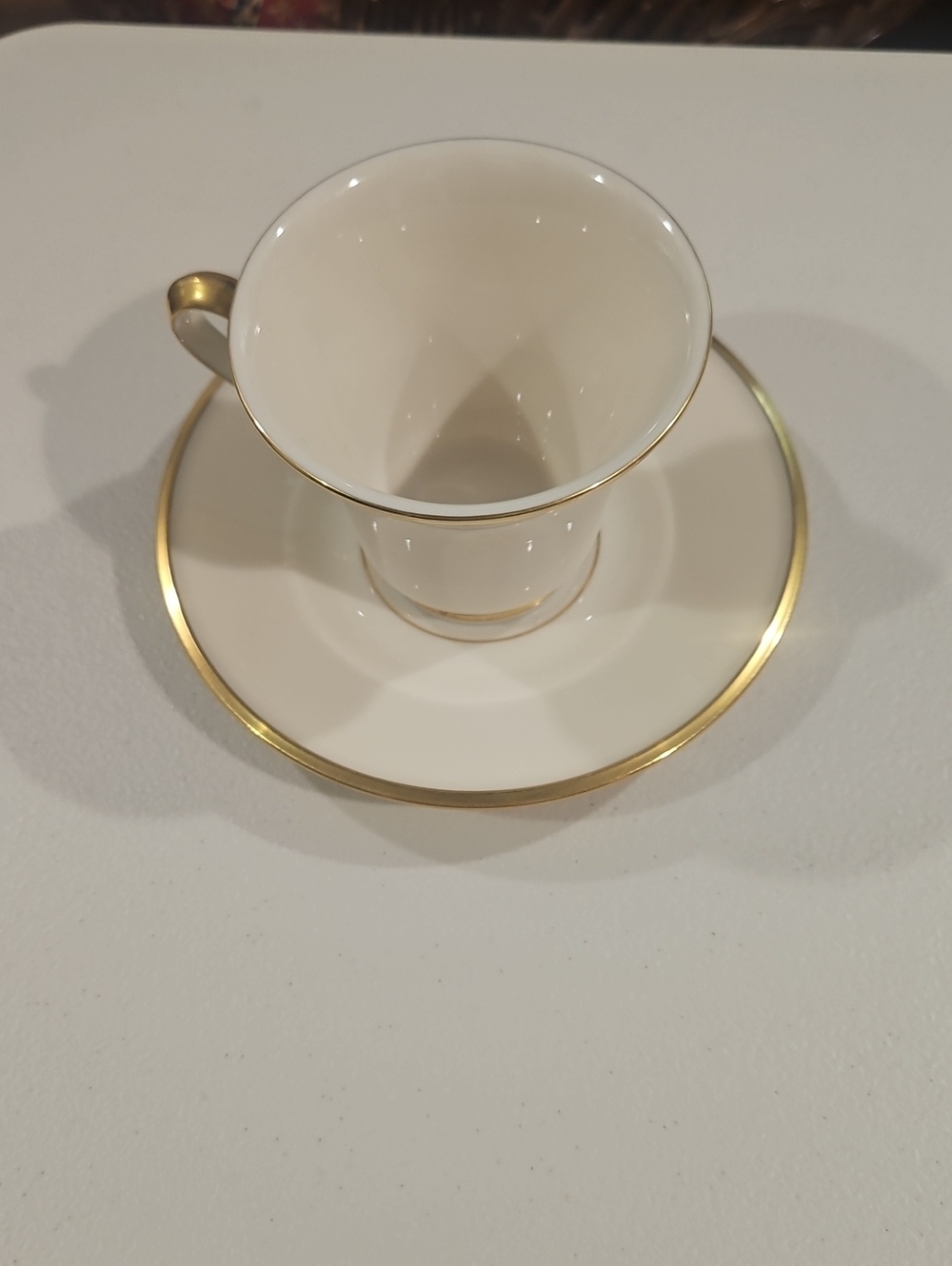 Lenox Cream Porcelain Teacup and Saucer with Gold Trim